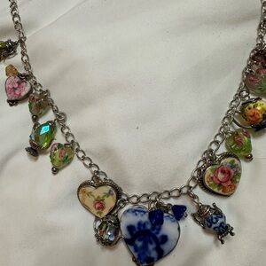 Floral Heart Charm Necklace. Made from broken china   It is sterling silver.